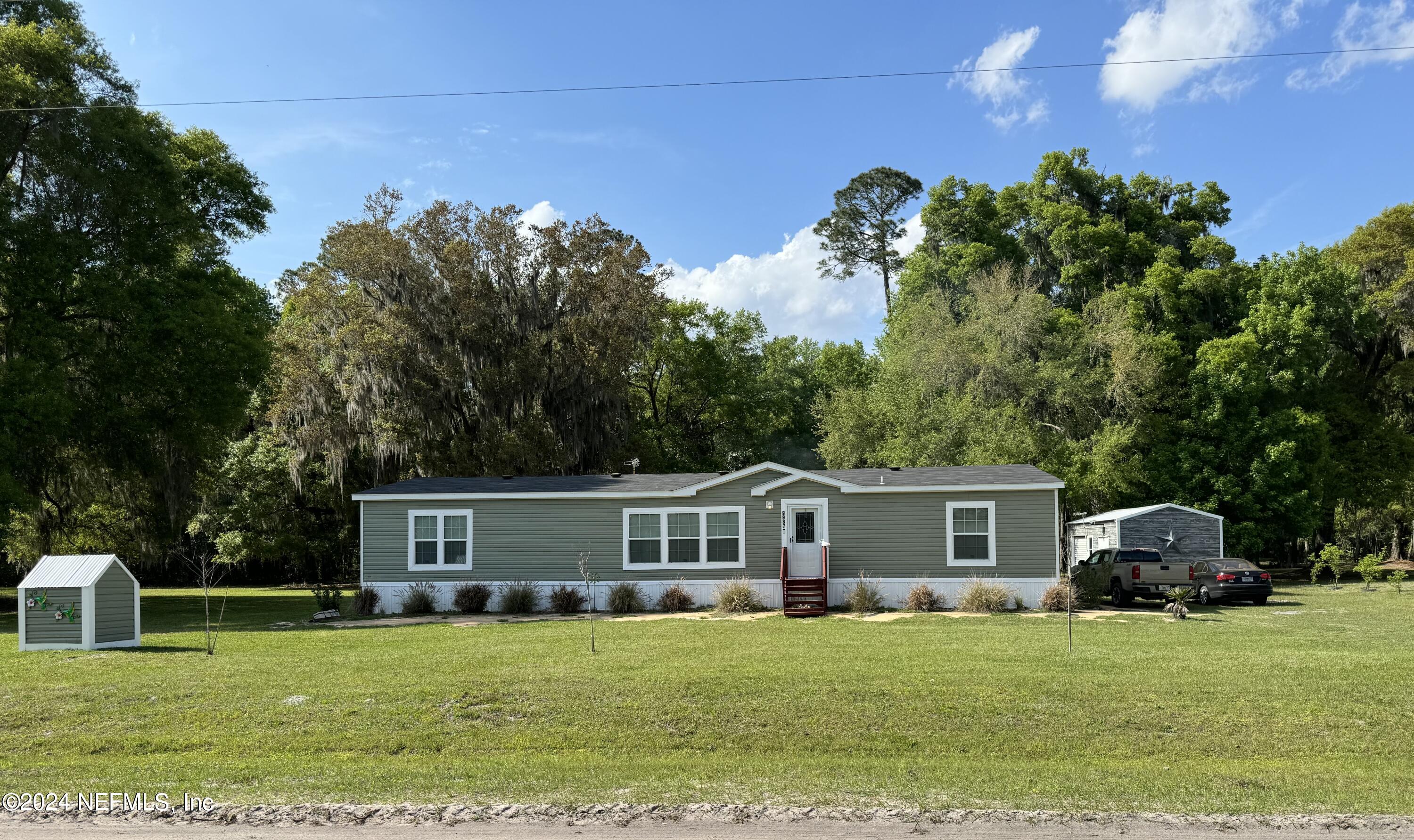 Starke, FL home for sale located at 9987 SW 136th Street, Starke, FL 32091