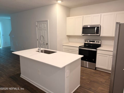 Photo of 9926 GARRIN Drive, Jacksonville, FL 32210 (MLS # 2167039)