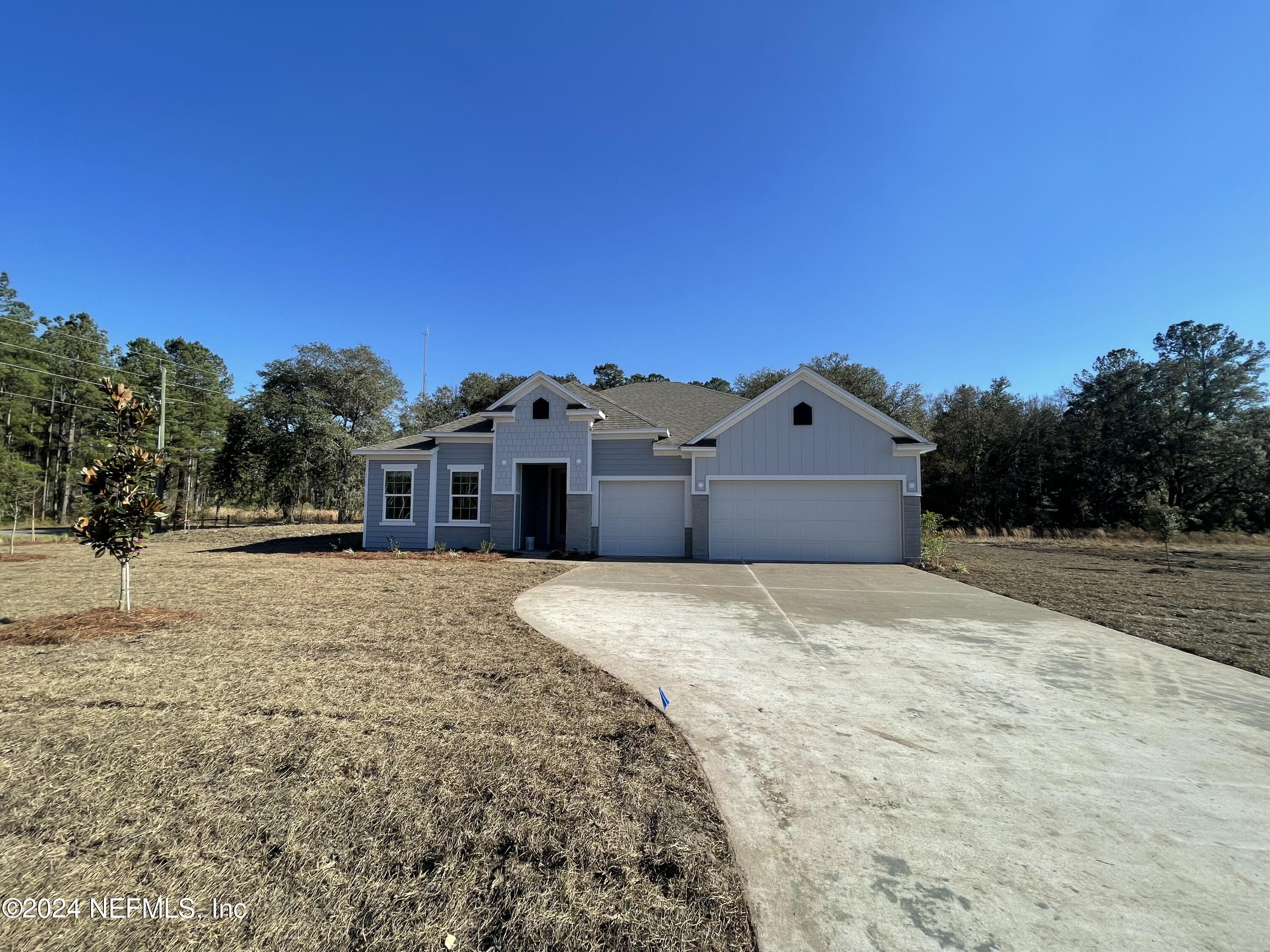 Yulee, FL home for sale located at 56310 CREEKSIDE Way, Yulee, FL 32097