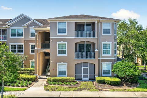 Photo of 7990 BAYMEADOWS Road E #404, Jacksonville, FL 32256 (MLS # 2151169)
