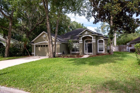 Photo of 1673 TALL TREE Drive E, Jacksonville, FL 32246 (MLS # 2150800)
