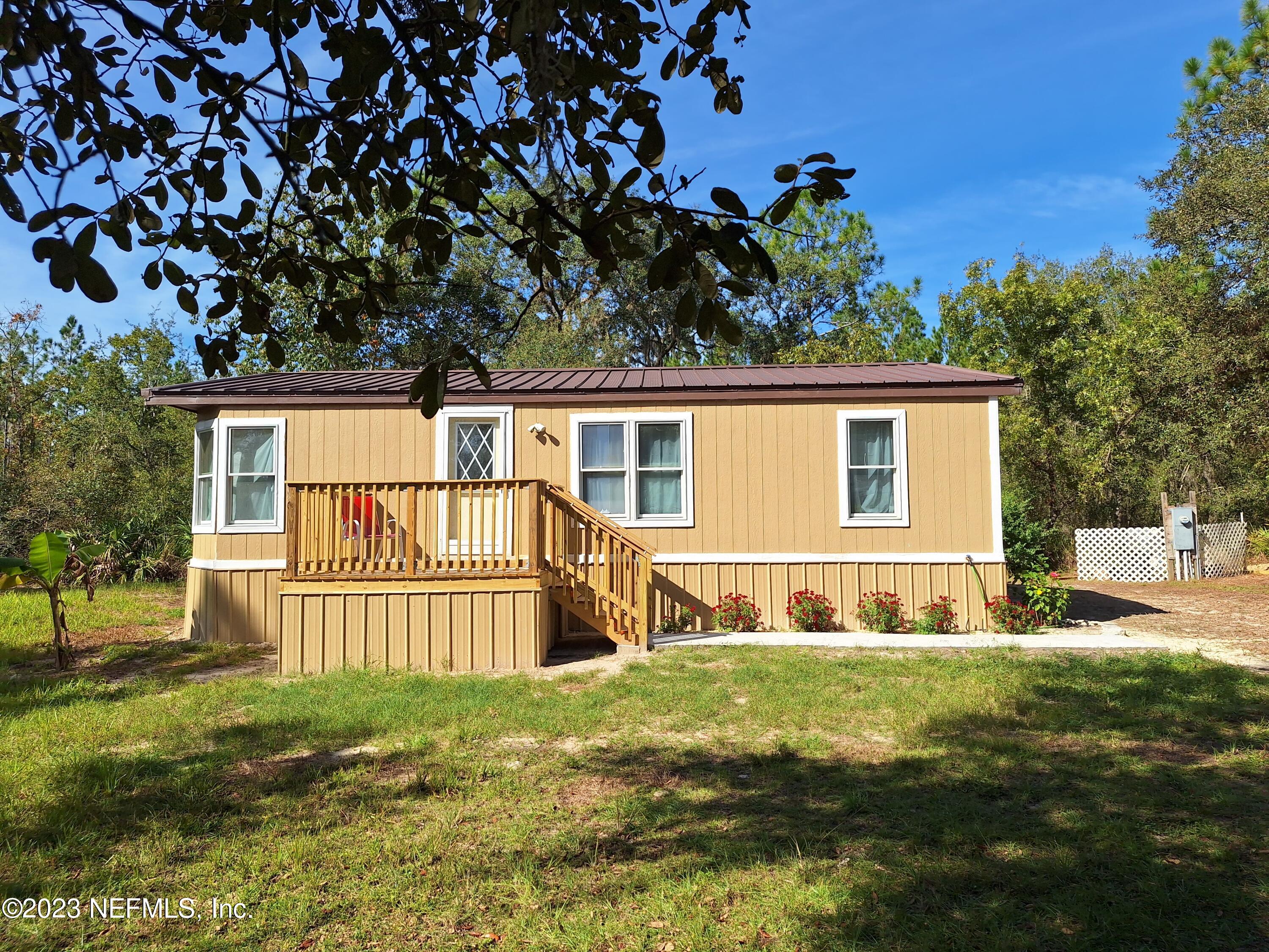 Hollister, FL home for sale located at 601 HOOVER Road, Hollister, FL 32147