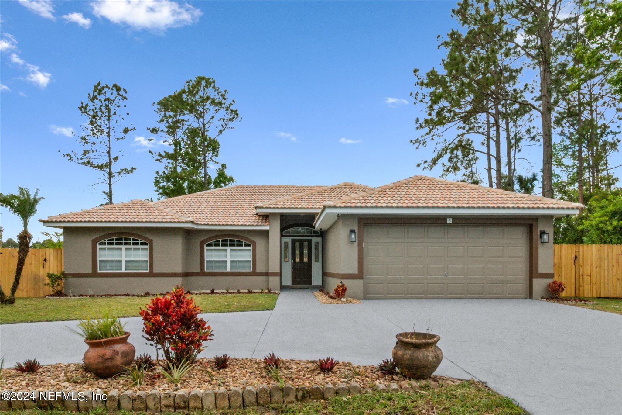 Palm Coast, FL home for sale located at 5 Port Royal Drive, Palm Coast, FL 32164