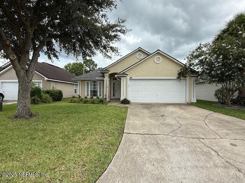 Photo of 1687 RUSTLING Drive, Fleming Island, FL 32003 (MLS # 2152736)