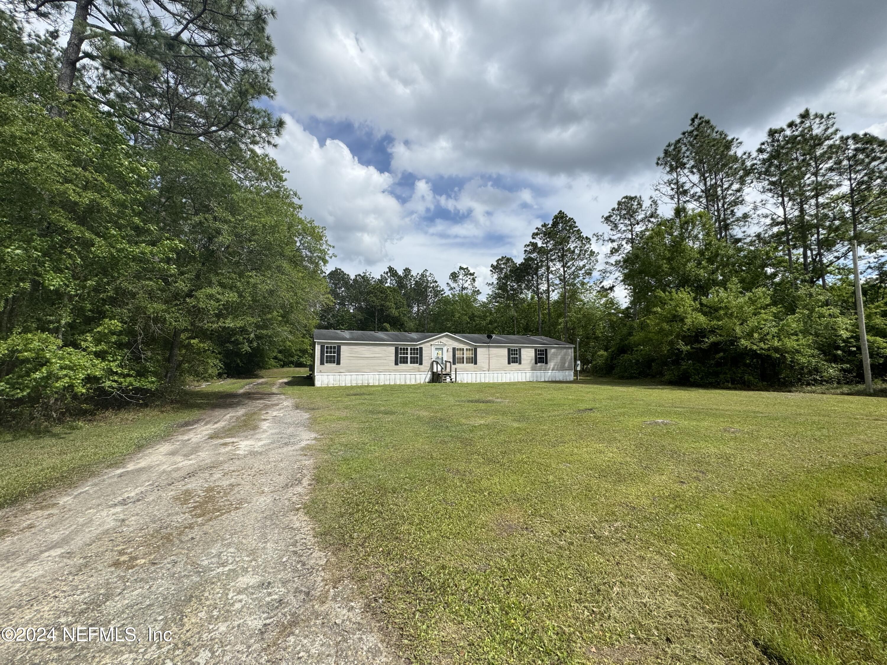 Lake Butler, FL home for sale located at 9282 SW 148TH Place, Lake Butler, FL 32054