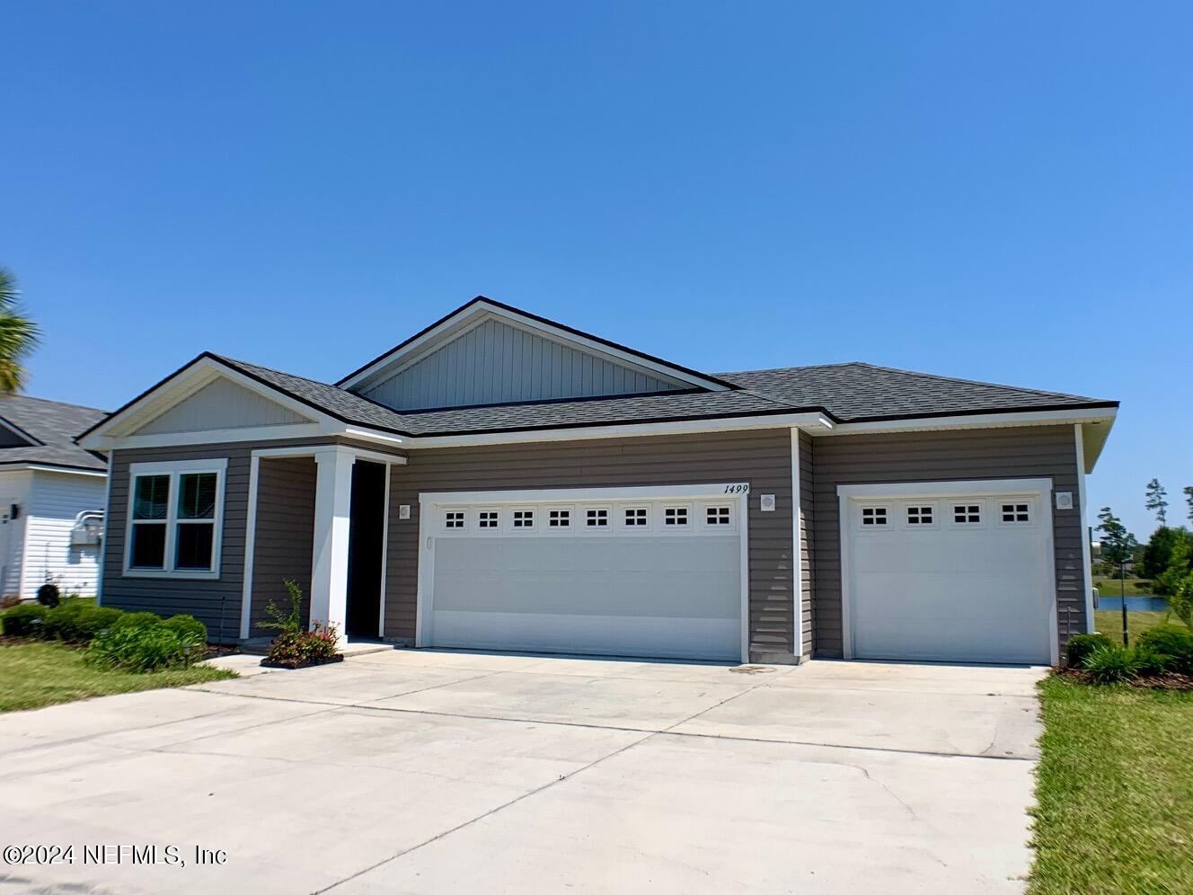 Middleburg, FL home for sale located at 1499 Tropical Pine Cove, Middleburg, FL 32068