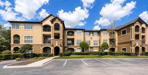 Photo of 10961 BURNT MILL Road #1421, Jacksonville, FL 32256 (MLS # 2159587)