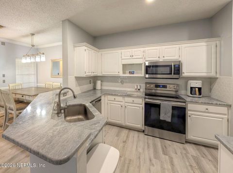 Photo of 10000 GATE Parkway #726, Jacksonville, FL 32246 (MLS # 2130130)