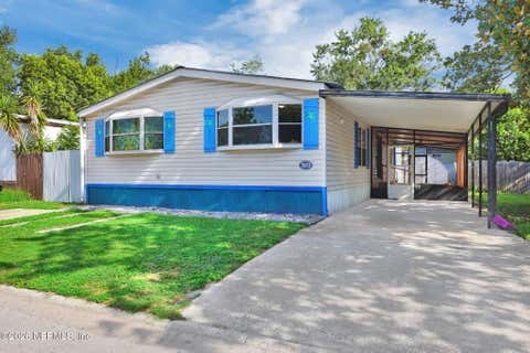 Photo of 7633 PLUMWOOD Drive, Jacksonville, FL 32256 (MLS # 2156884)