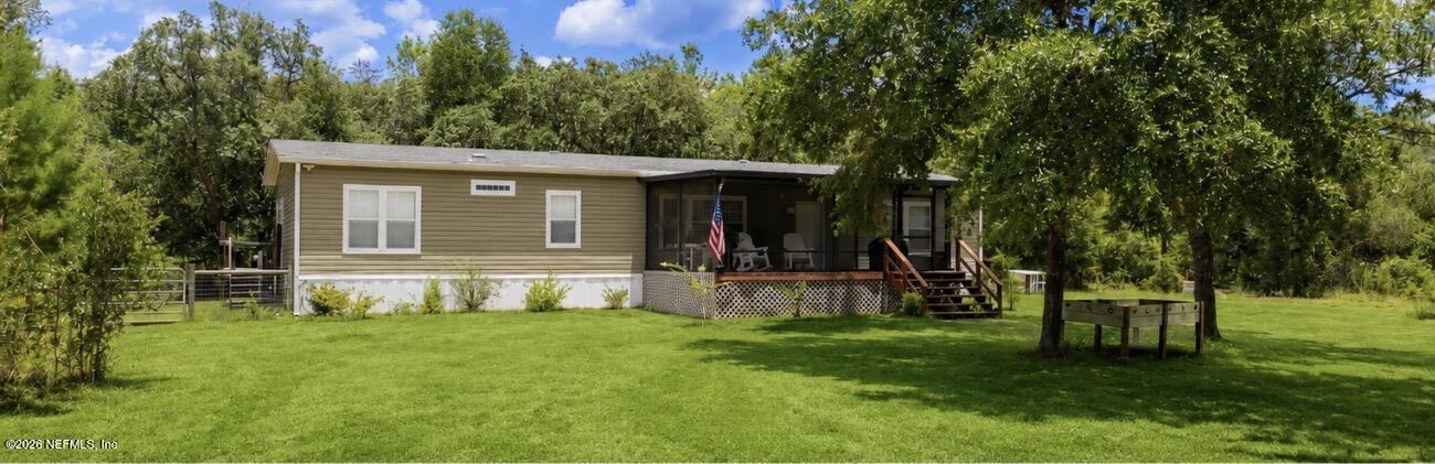 Photo 1 of 61 — 179 KINGFISH Road, Pomona Park, FL 32181