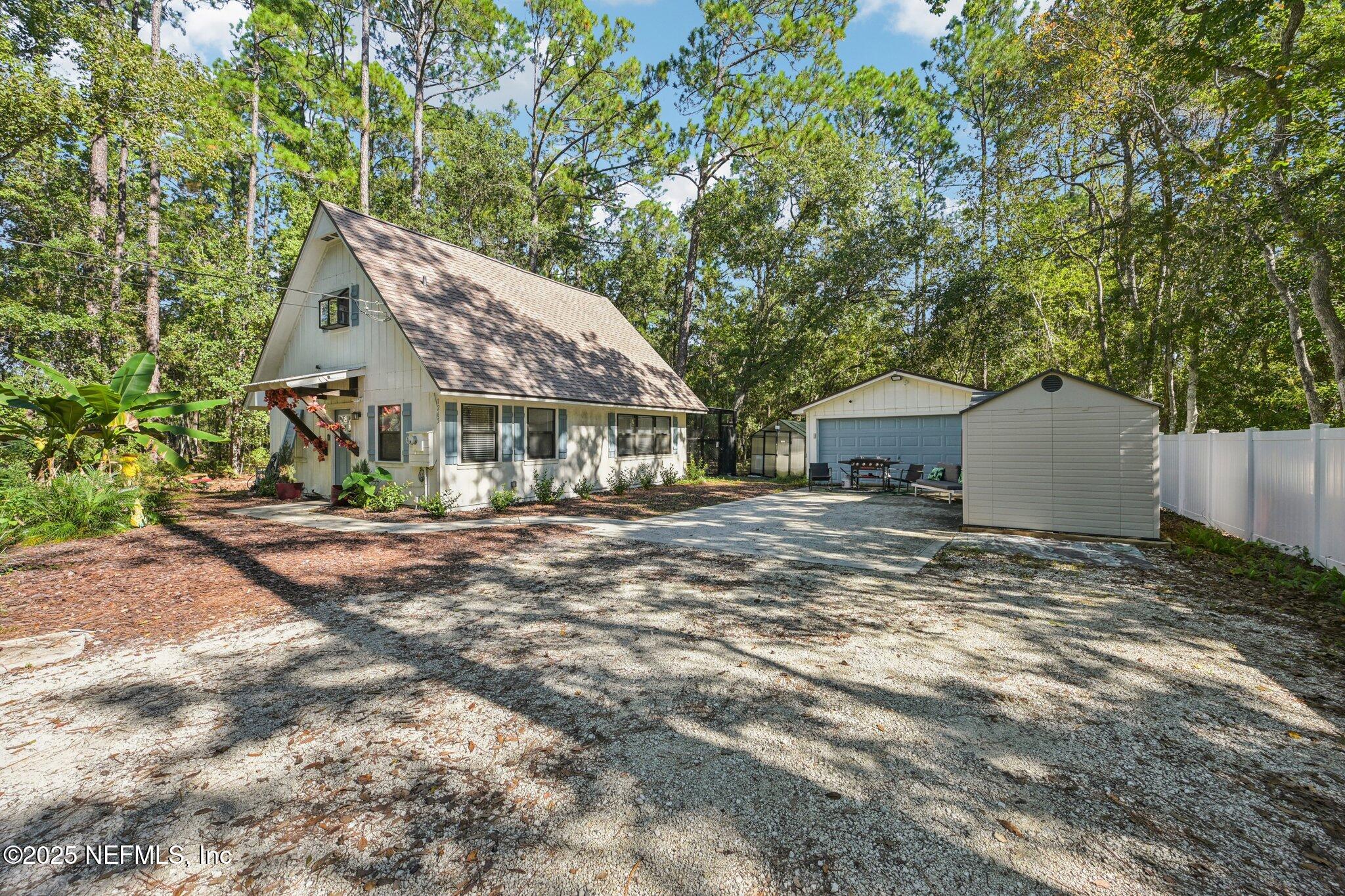 1265 WHISPERING PINES Road
