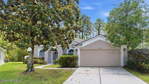 Photo of 10642 ROUNDWOOD GLEN Court, Jacksonville, FL 32256 (MLS # 2156950)