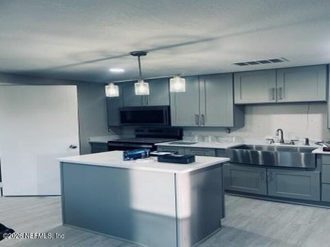 Photo of 2471 FERNSIDE Road, Jacksonville, FL 32246 (MLS # 2166016)