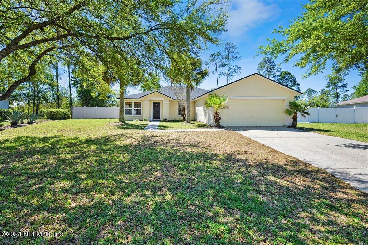 Yulee, FL home for sale located at 86624 CARTESIAN POINTE Drive, Yulee, FL 32097