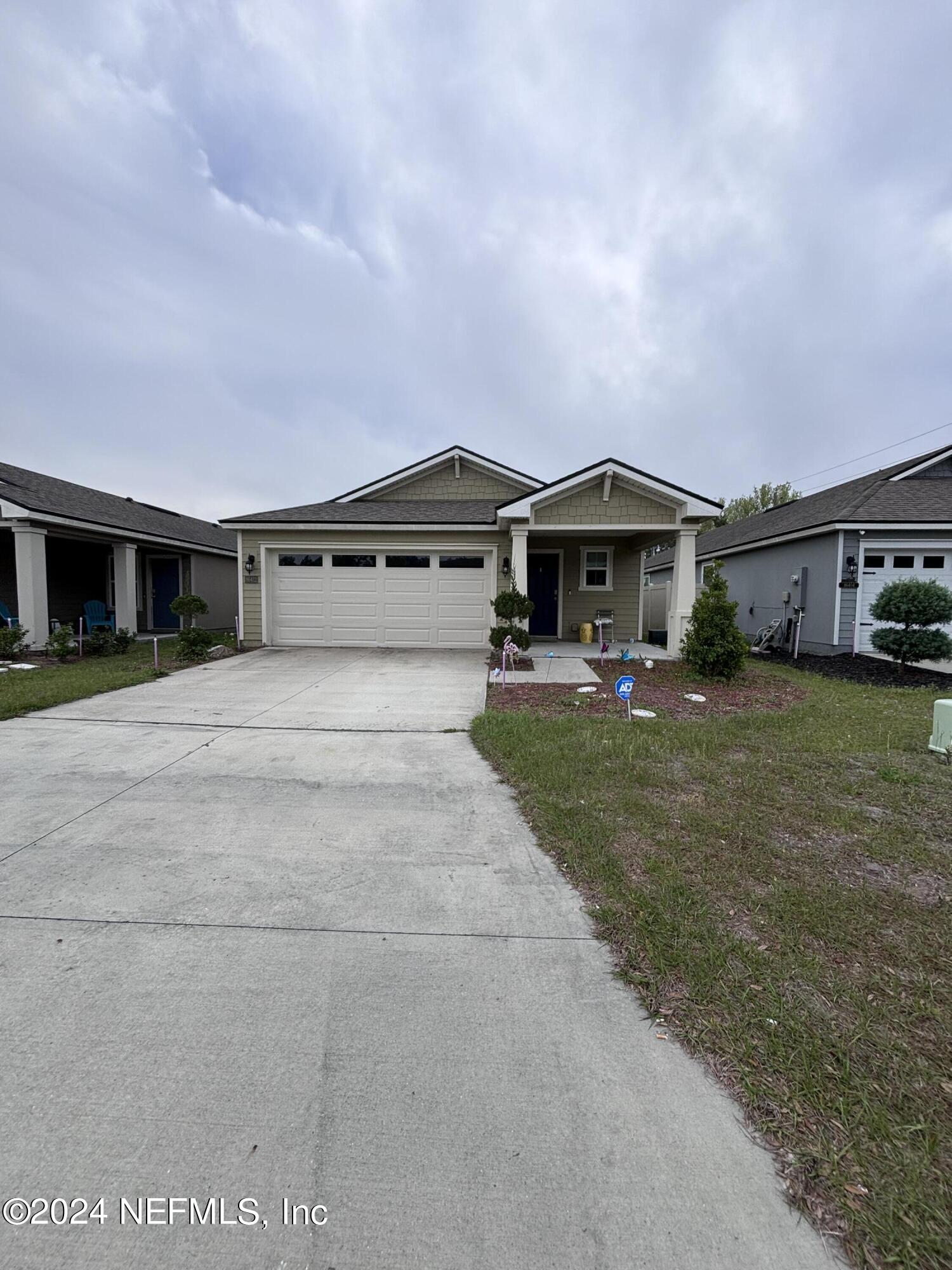 Yulee, FL home for sale located at 86412 NASSAU CROSSING Way, Yulee, FL 32097