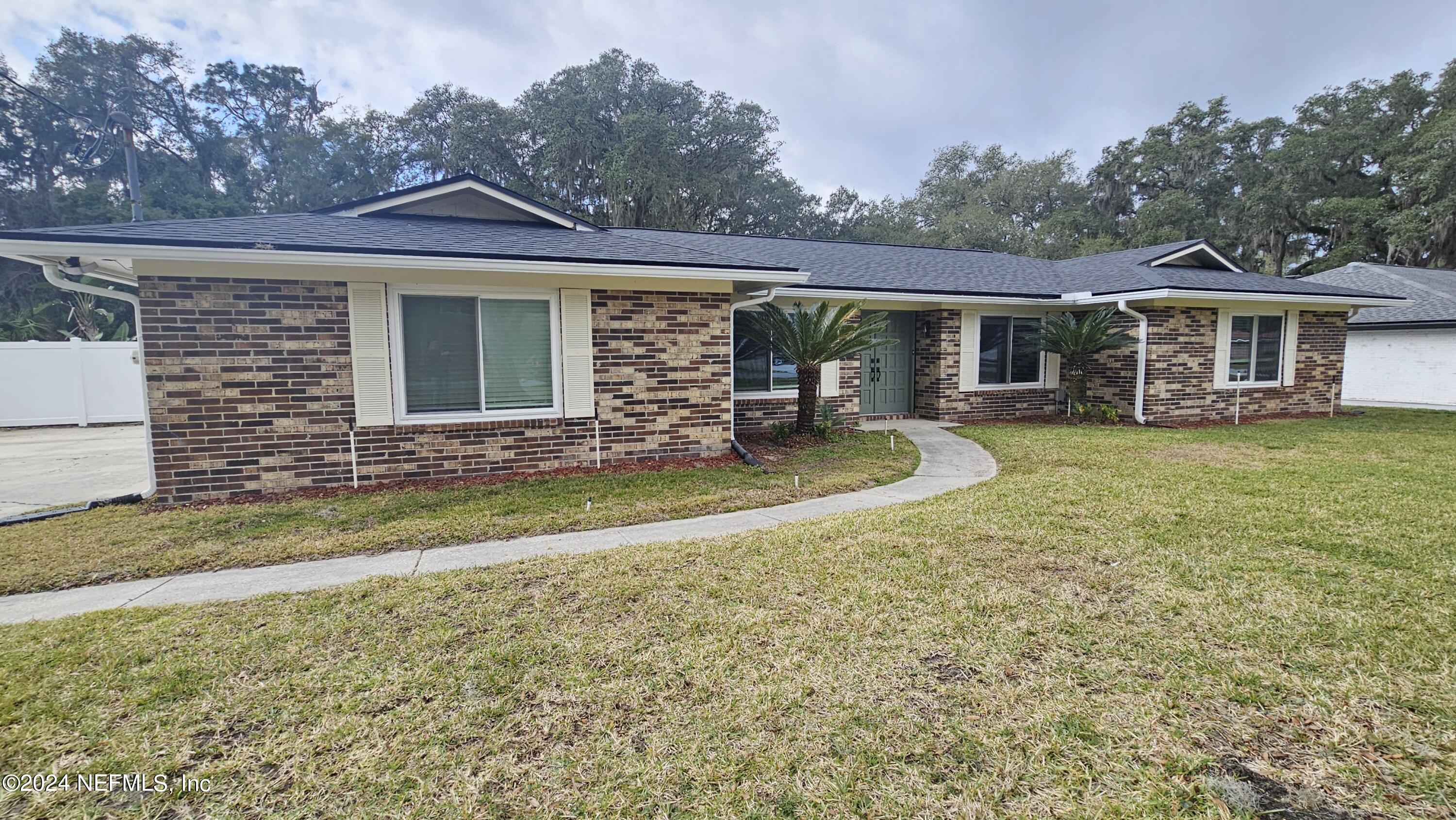 St Johns, FL home for sale located at 912 Fruitwood Drive, St Johns, FL 32259