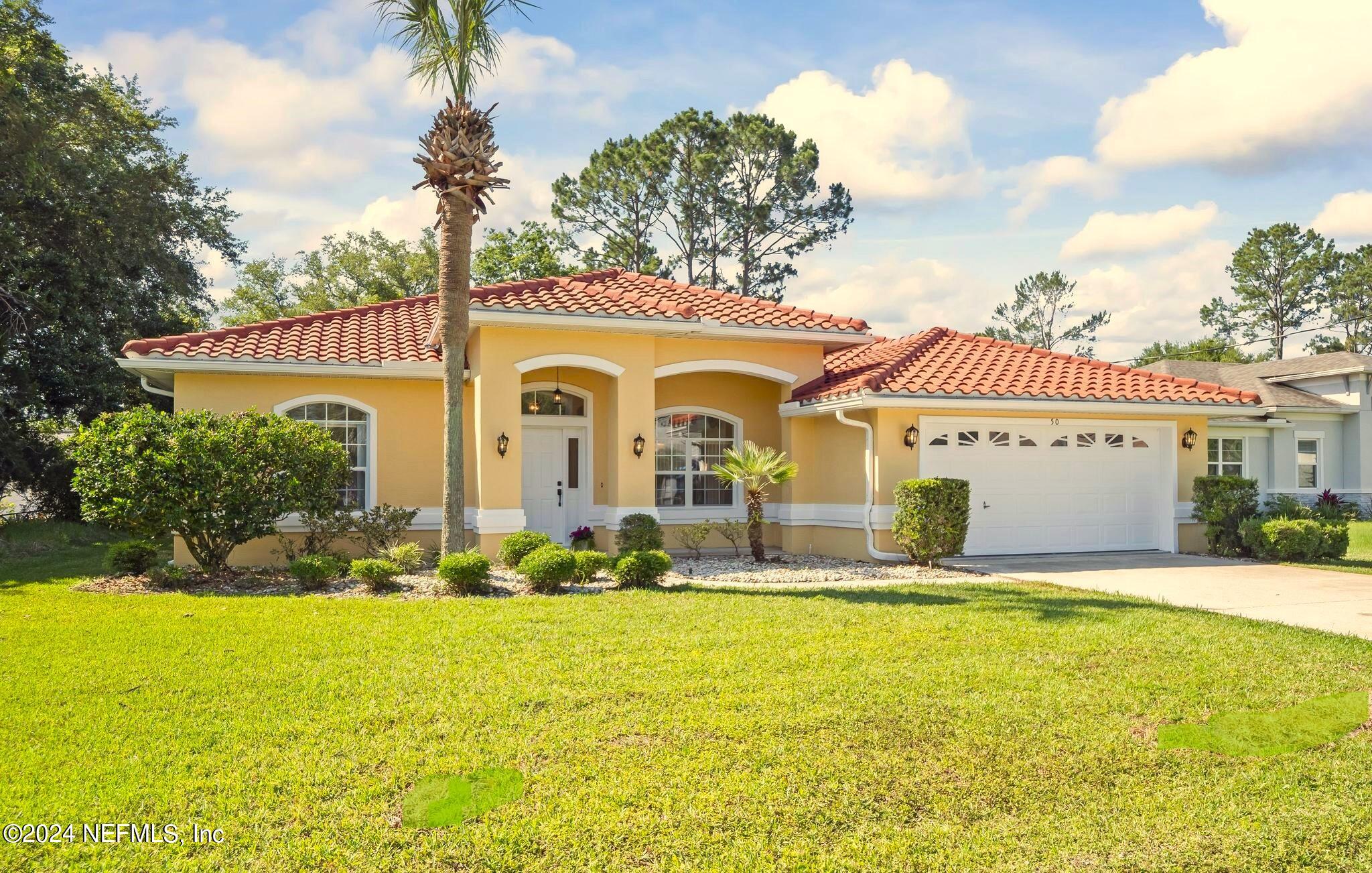 Palm Coast, FL home for sale located at 50 Persimmon Drive, Palm Coast, FL 32164