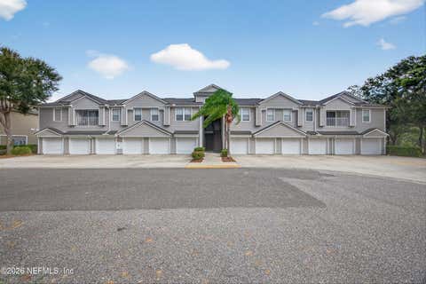 Photo of 7047 DEER LODGE Circle #106, Jacksonville, FL 32256 (MLS # 2156549)