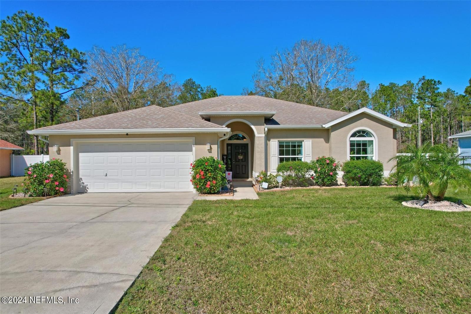 Palm Coast, FL home for sale located at 8 SLIPPERY ROCK Place, Palm Coast, FL 32164