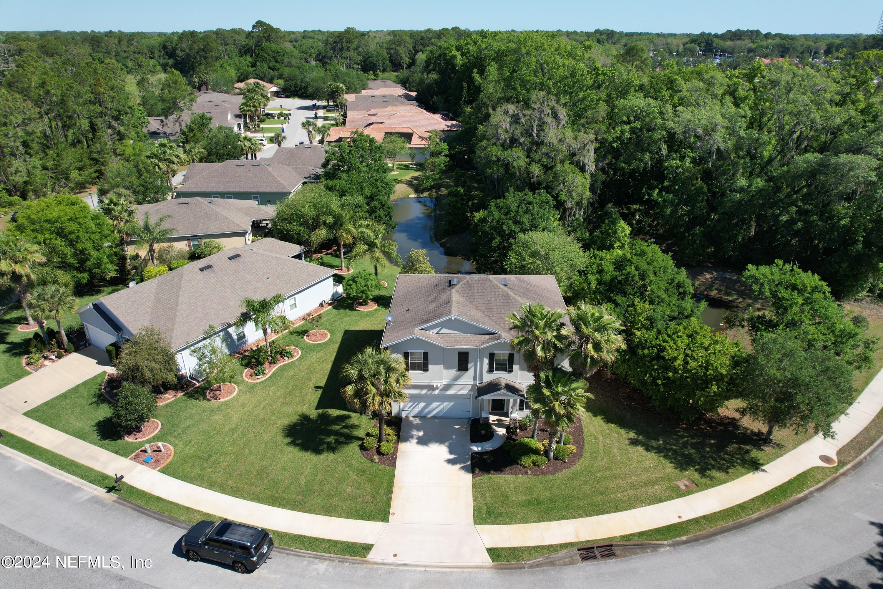 St Augustine, FL home for sale located at 210 Mission Trace Drive, St Augustine, FL 32084