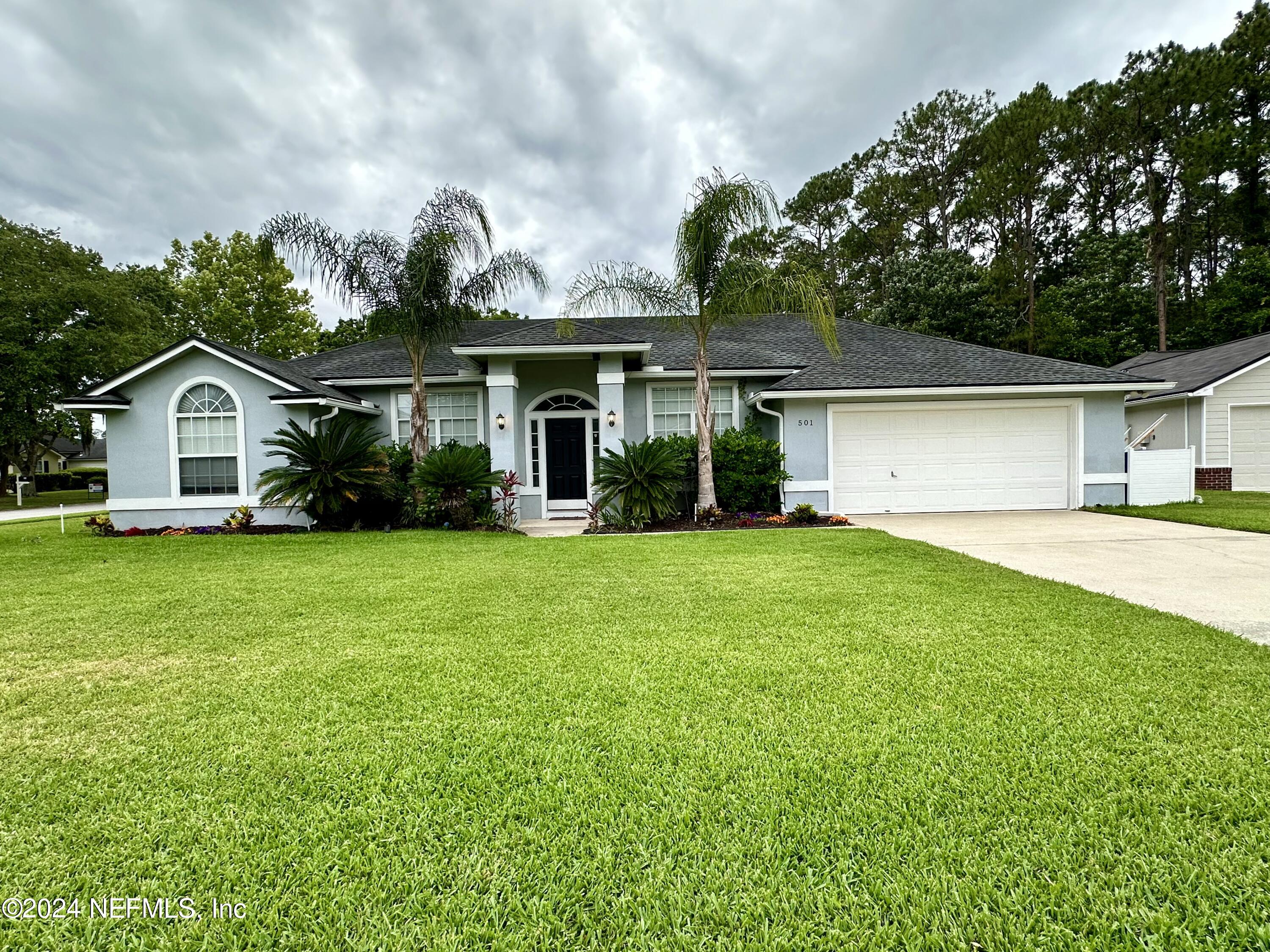 St Johns, FL home for sale located at 501 Magnolia Garden Court, St Johns, FL 32259