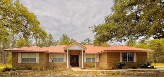 Hawthorne, FL home for sale located at 163 Melrose Landing Drive, Hawthorne, FL 32640
