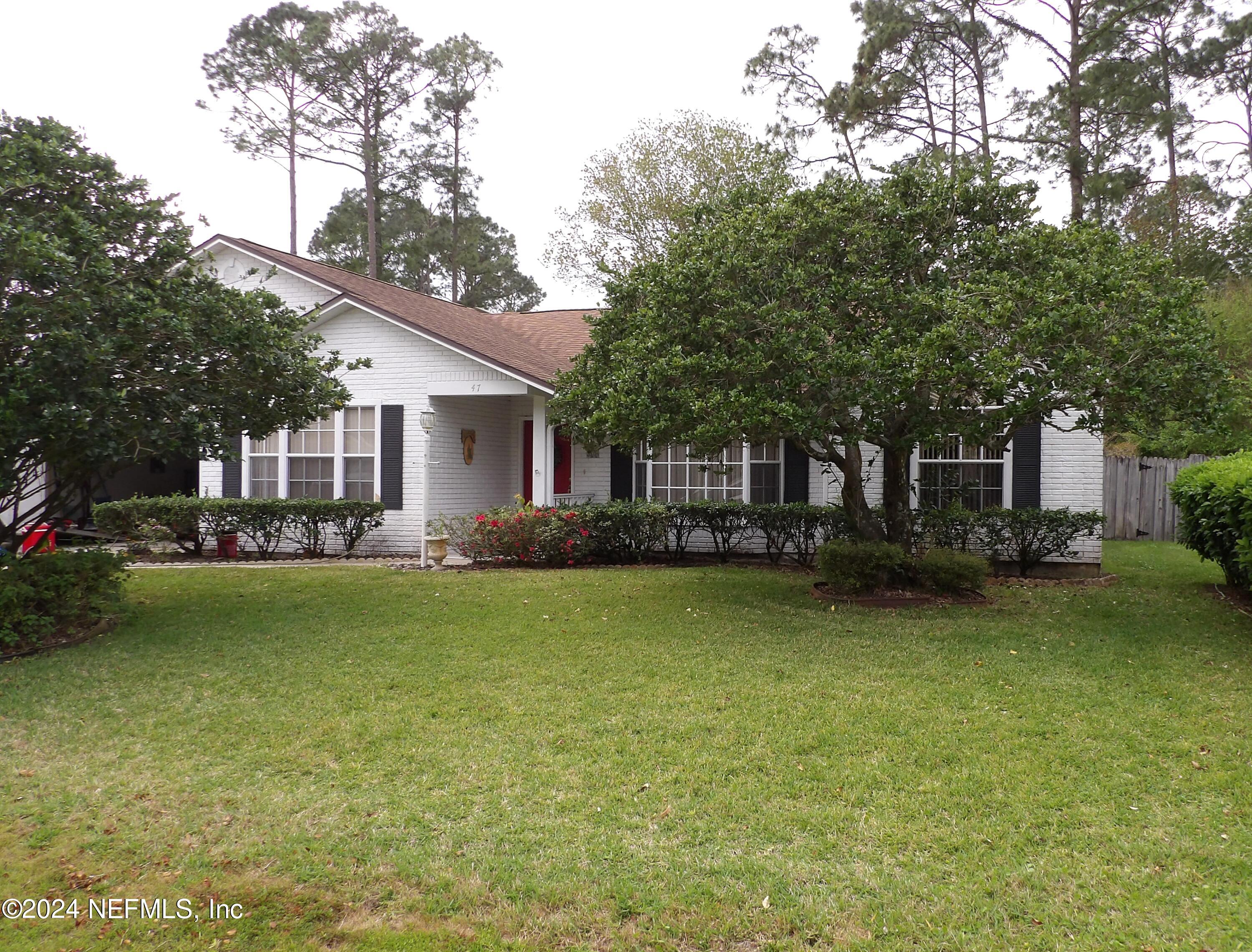 Palm Coast, FL home for sale located at 47 Bannerwood Lane, Palm Coast, FL 32137