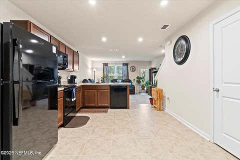 Photo of 5893 CREEKSIDE CROSSING Drive, Jacksonville, FL 32210 (MLS # 2151829)