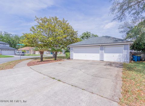 Photo of 12028 N COBBLESTONE FOREST Circle, Jacksonville, FL 32225 (MLS # 2143479)