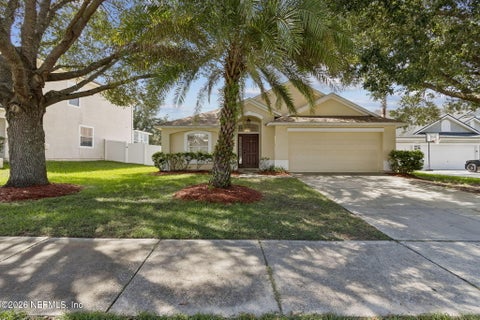 Photo of 966 OTTER CREEK Drive, Orange Park, FL 32065 (MLS # 2163866)