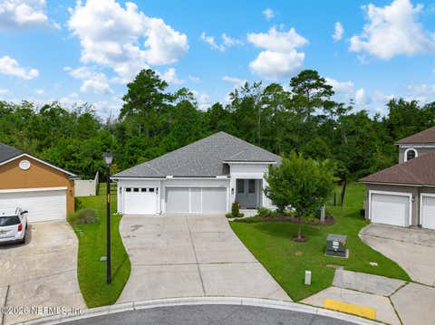 Photo of 3806 HAMMOCK BLUFF Drive, Jacksonville, FL 32226 (MLS # 2160111)