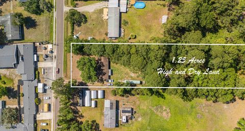 Photo of 12746 DUNN CREEK Road, Jacksonville, FL 32218 (MLS # 2144006)