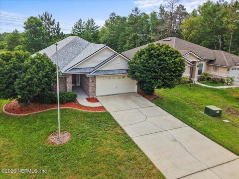 Photo of 945 RAINDROP Lane, Middleburg, FL 32068 (MLS # 2151153)