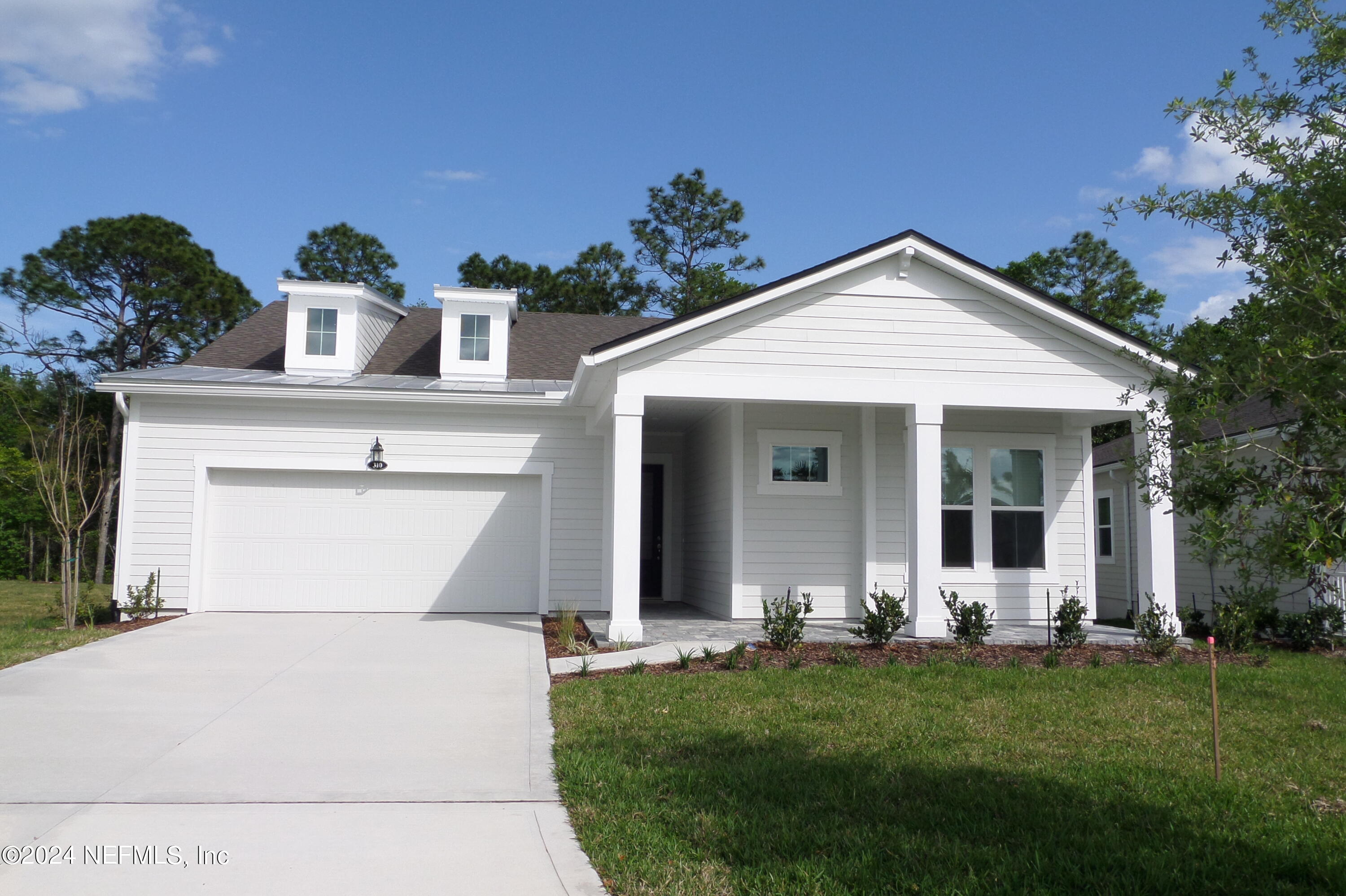 St Johns, FL home for sale located at 310 Ladyslipper Drive, St Johns, FL 32259