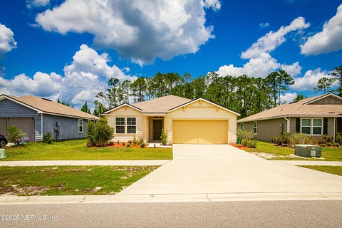 Photo of 70021 MISTY LAKE Court, Yulee, FL 32097 (MLS # 2153003)