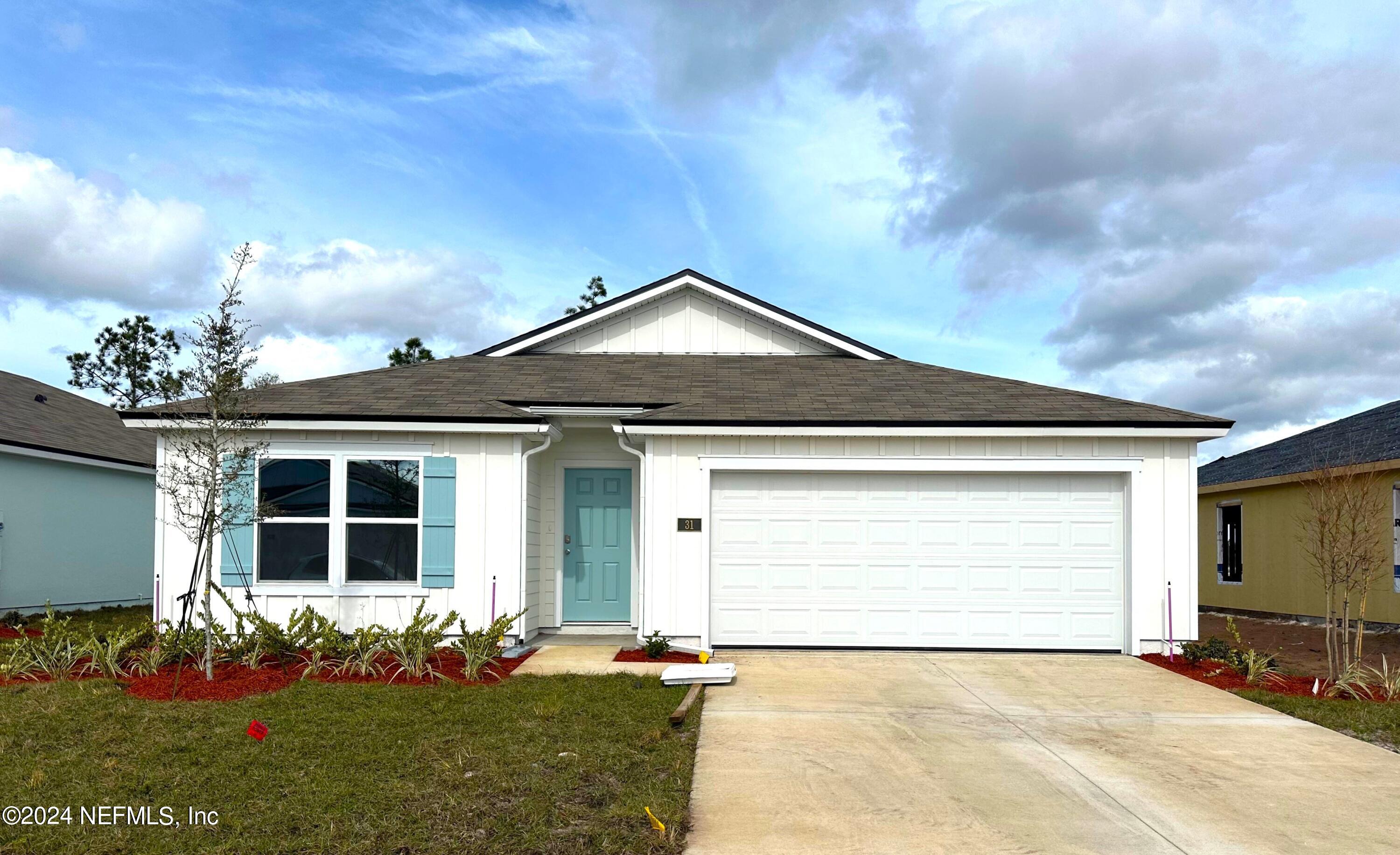 Palm Coast, FL home for sale located at 31 Hulett Woods Road, Palm Coast, FL 32137