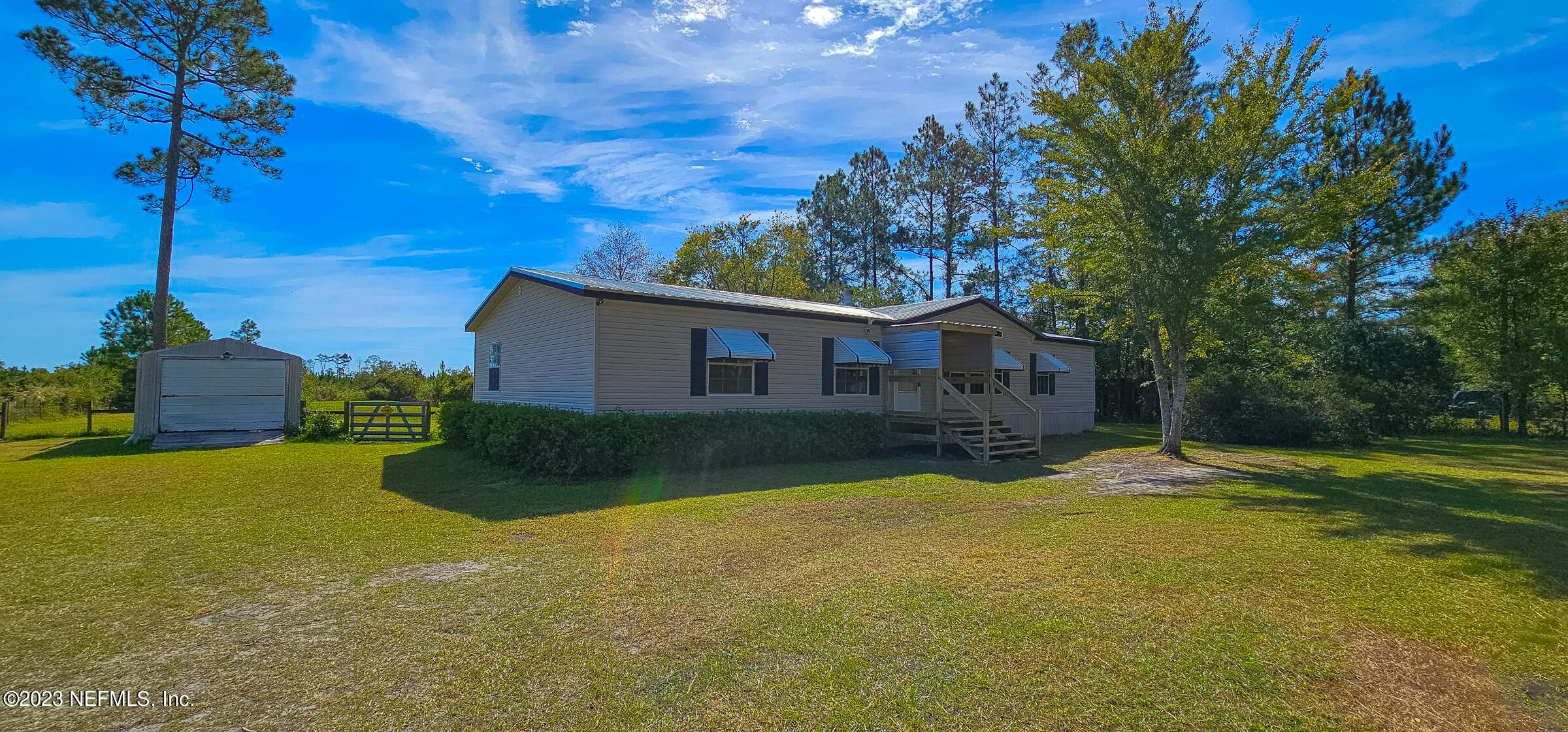 Bryceville, FL home for sale located at 11169 County Road 121, Bryceville, FL 32009
