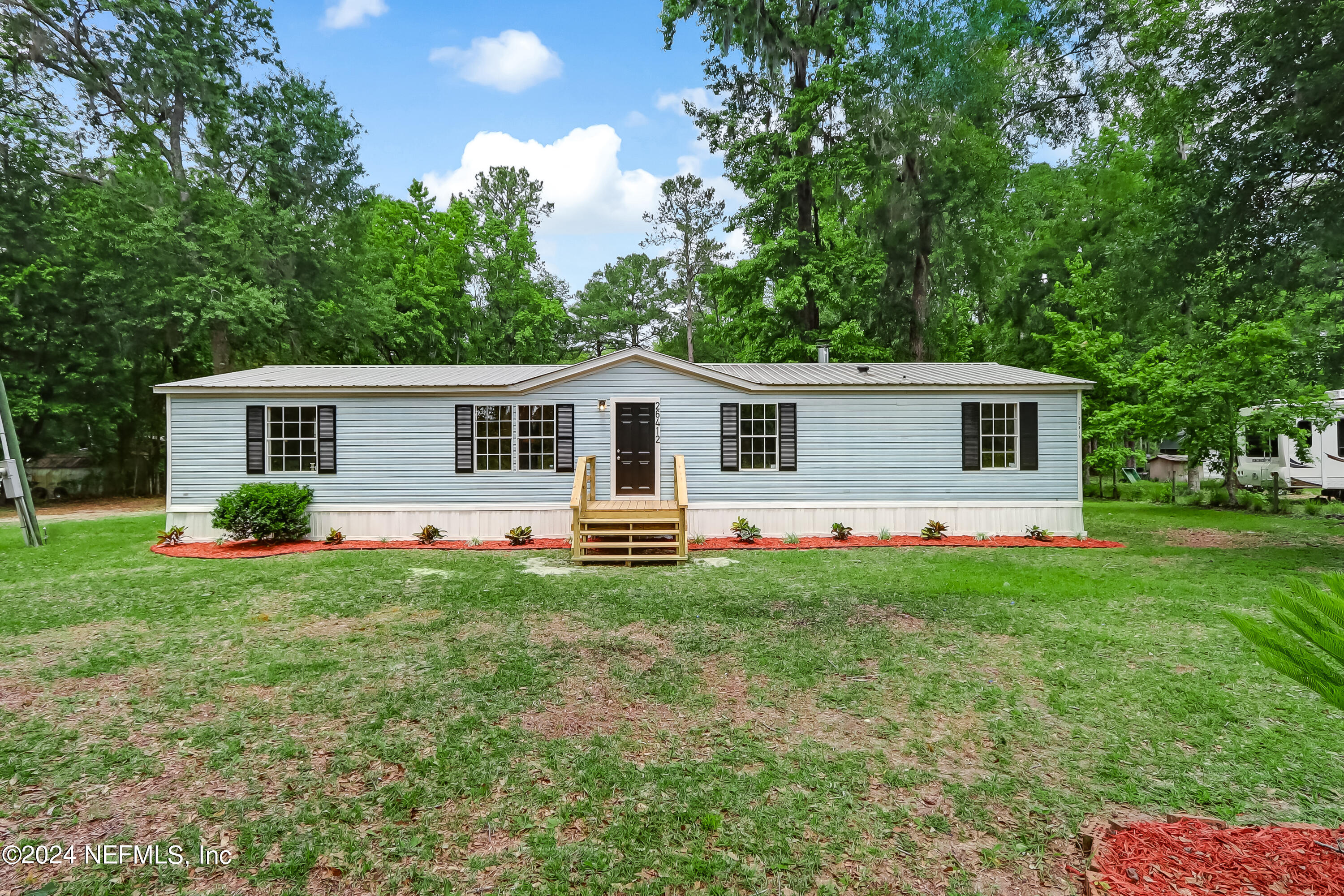 Hilliard, FL home for sale located at 26412 Willie Hodges Road, Hilliard, FL 32046
