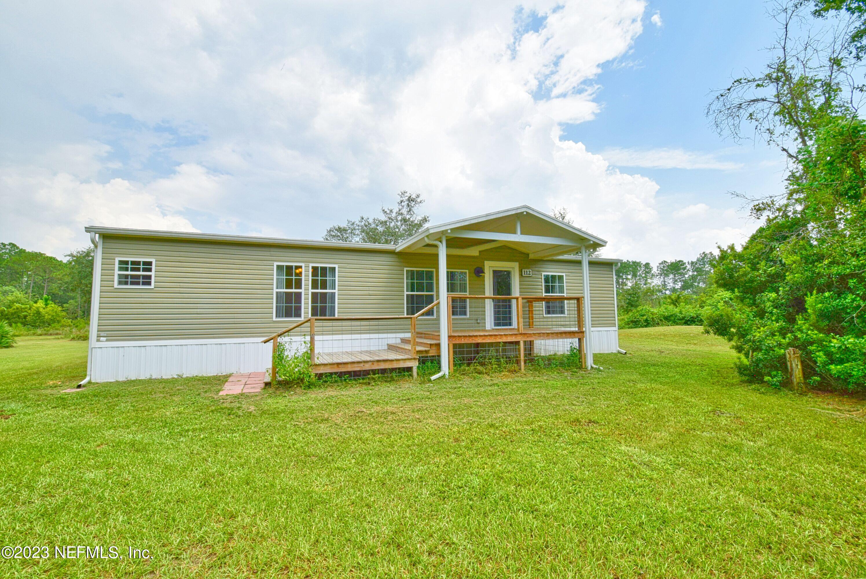 Hollister, FL home for sale located at 112 LITTLE PERRY Lane, Hollister, FL 32147