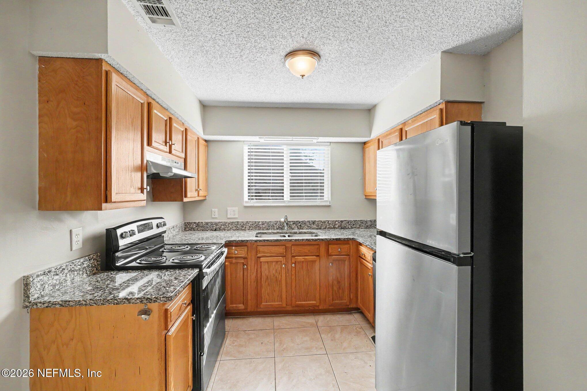 11737 WATTLE TREE Court