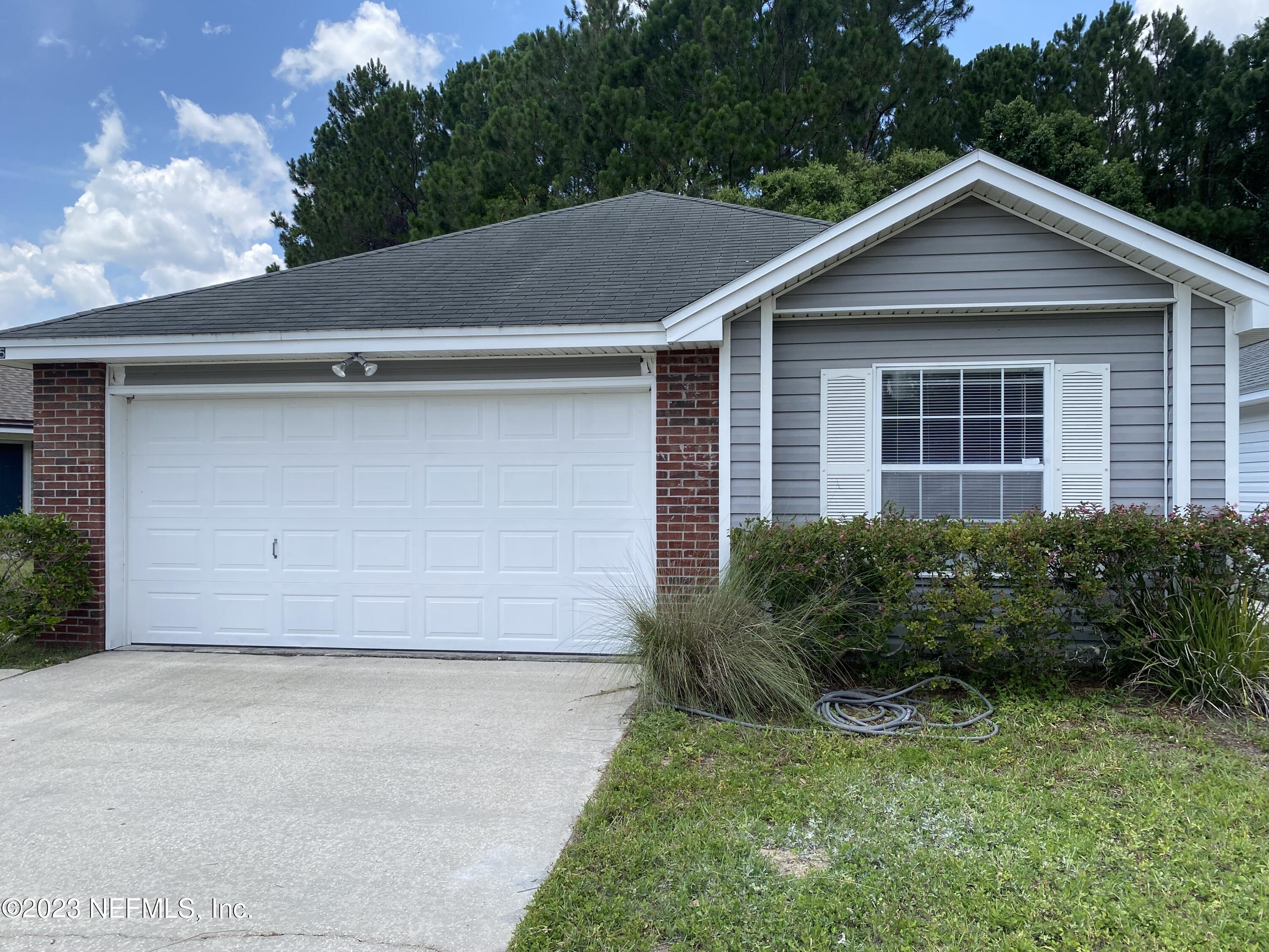 YULEE, FL home for sale located at 96055 CORAL REEF RD, YULEE, FL 32097