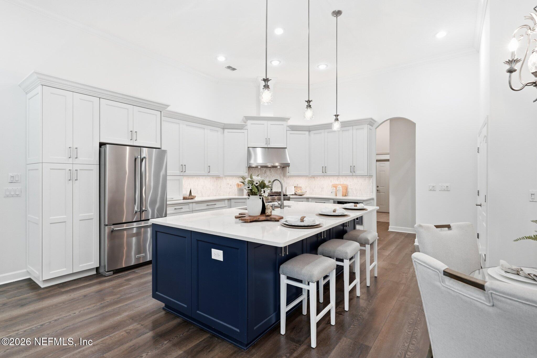 Completely reimagined and beautifully updated from top to bottom, this – image 12