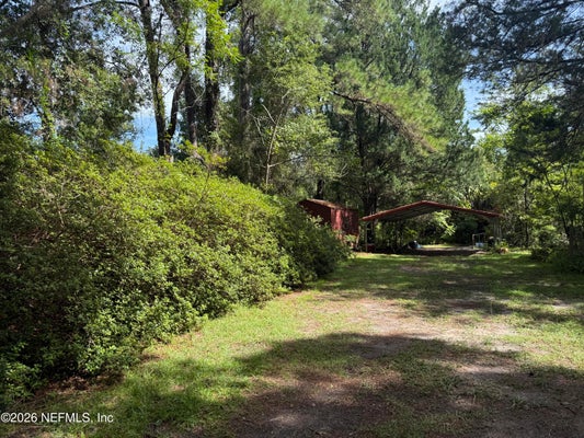 56063 NASSAU OAKS DR, CALLAHAN, FL 32011 - Image a3bbf358e2def96211b2e89f889a4e89/1263585164