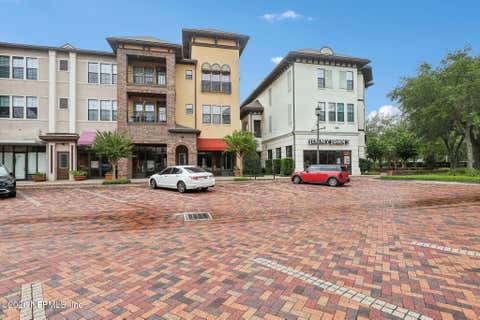 Photo of 9823 TAPESTRY PARK Circle #119, Jacksonville, FL 32246 (MLS # 2158725)
