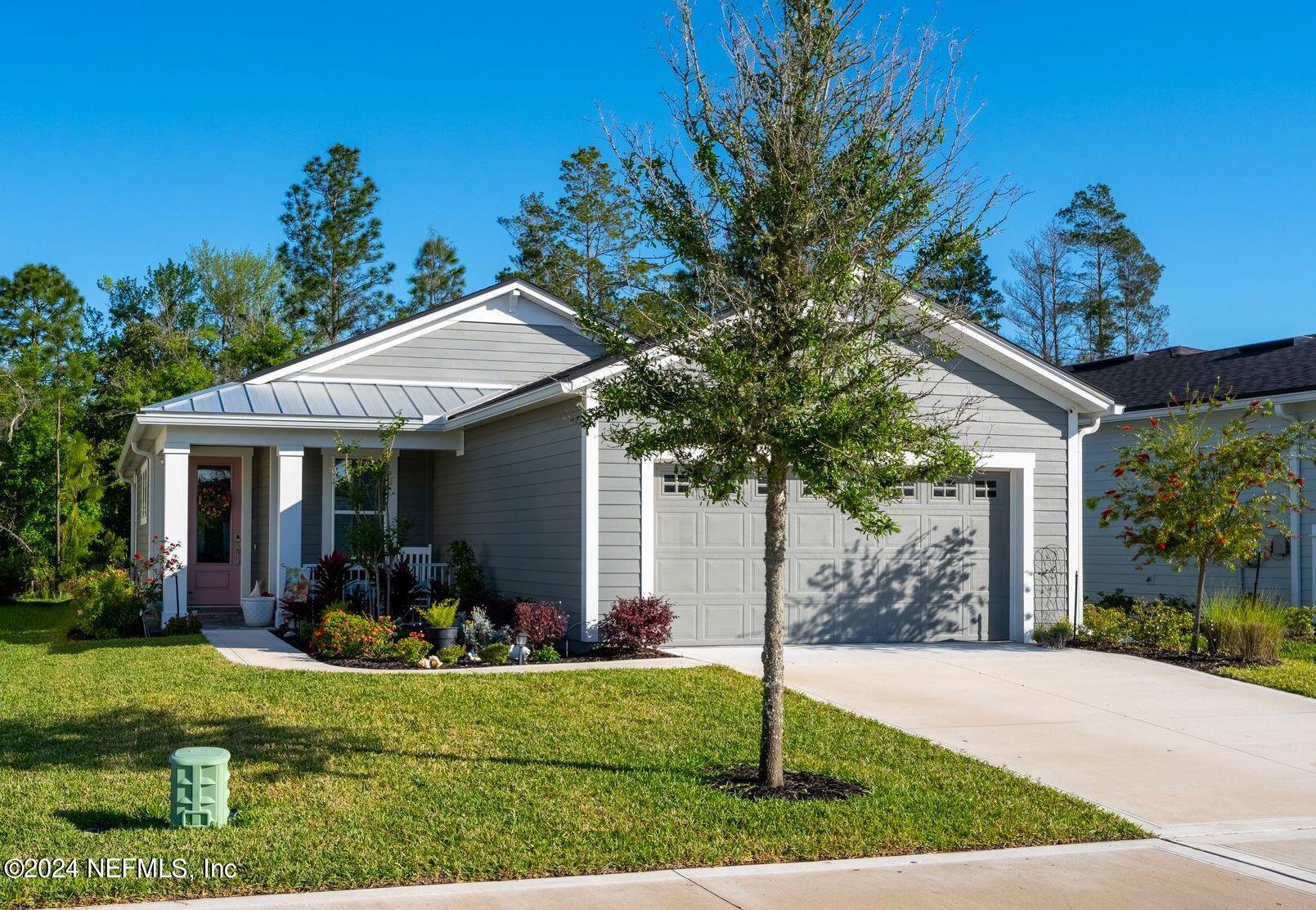 St Johns, FL home for sale located at 326 Juniper Hills Drive, St Johns, FL 32259