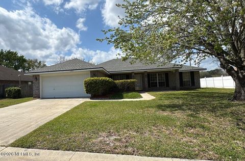 Photo of 1254 MCGIRTS CREEK Drive E, Jacksonville, FL 32221 (MLS # 2145428)