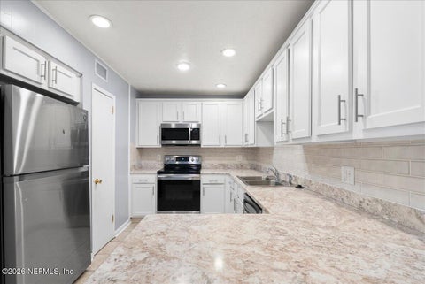 Photo of 11634 MARINA Drive, Jacksonville, FL 32246 (MLS # 2166609)