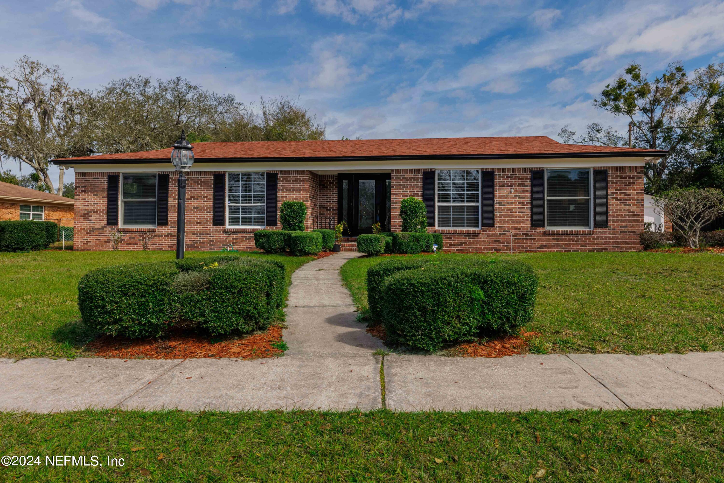 Jacksonville, FL home for sale located at 9557 WHITTINGTON Drive, Jacksonville, FL 32257