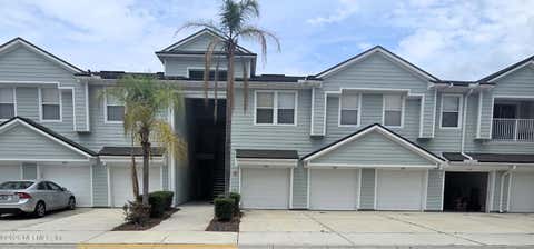 Photo of 7047 DEER LODGE Circle #102, Jacksonville, FL 32256 (MLS # 2148572)
