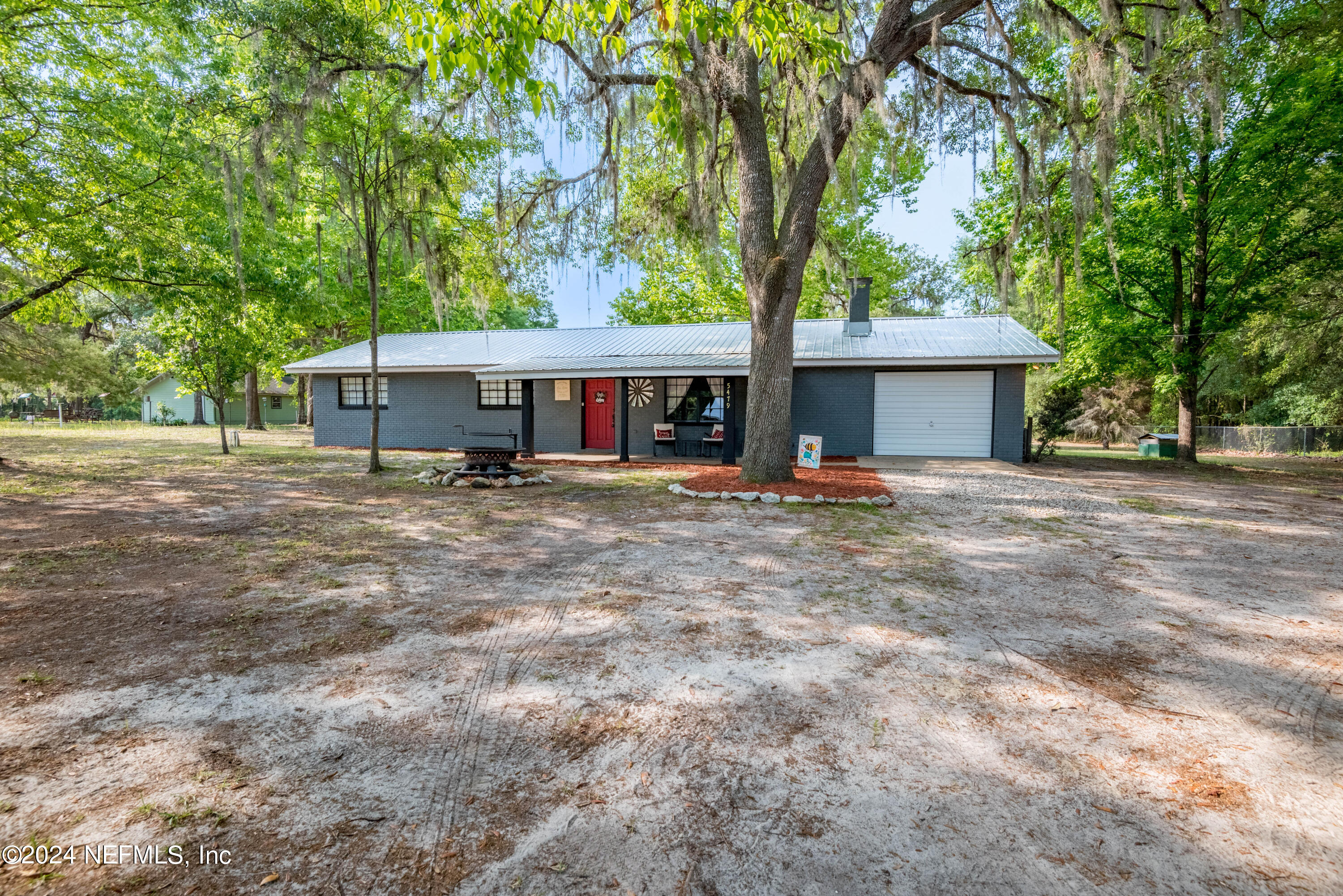 High Springs, FL home for sale located at 5479 NE 54th Place, High Springs, FL 32643